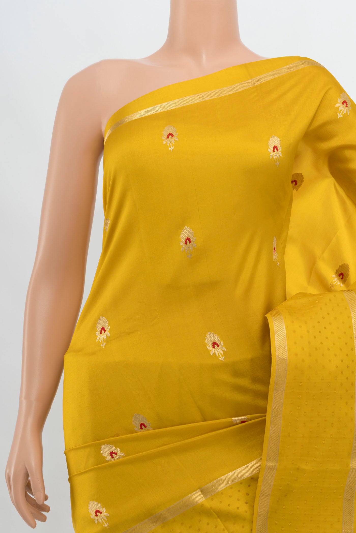 Border image of Yellow Banarasi Katan Silk Saree with Zari Butta on the body and Silk Border. 