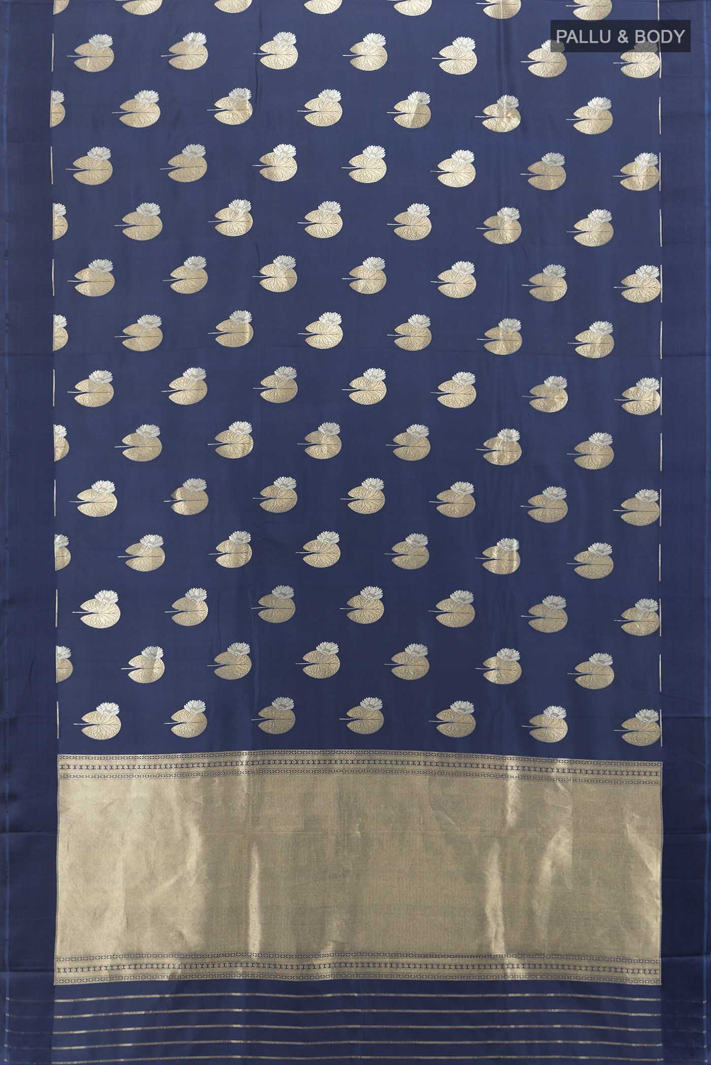 Flat view of Navy Blue Banarasi Katan Silk Saree with Zari Butta on the body and Zari Border. 