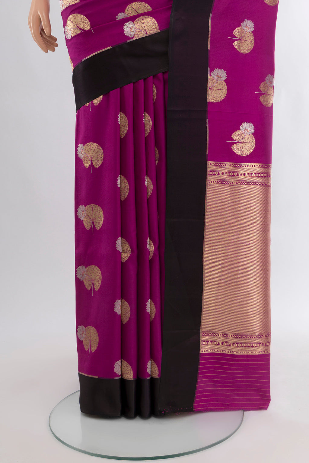 Pleats and pallu of Purple Banarasi Katan Silk Saree with Zari Butta on the body and Fancy Border. 