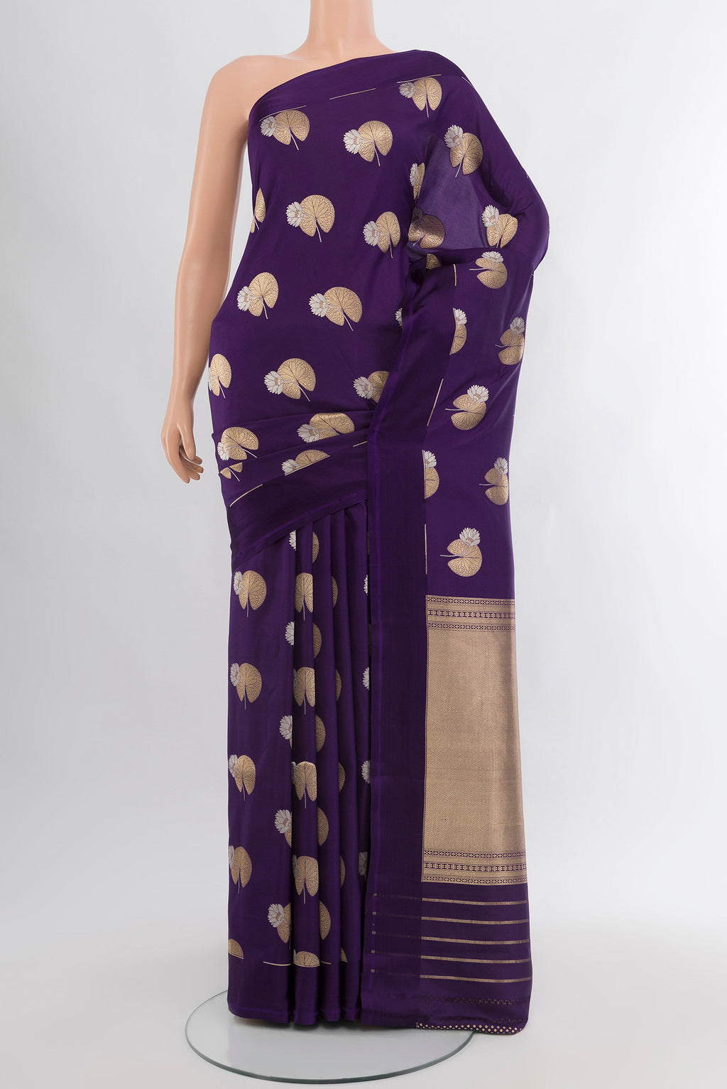 Violet Banarasi Silk Saree with Zari Butta on the body and Plain Border.  displayed on a mannequin