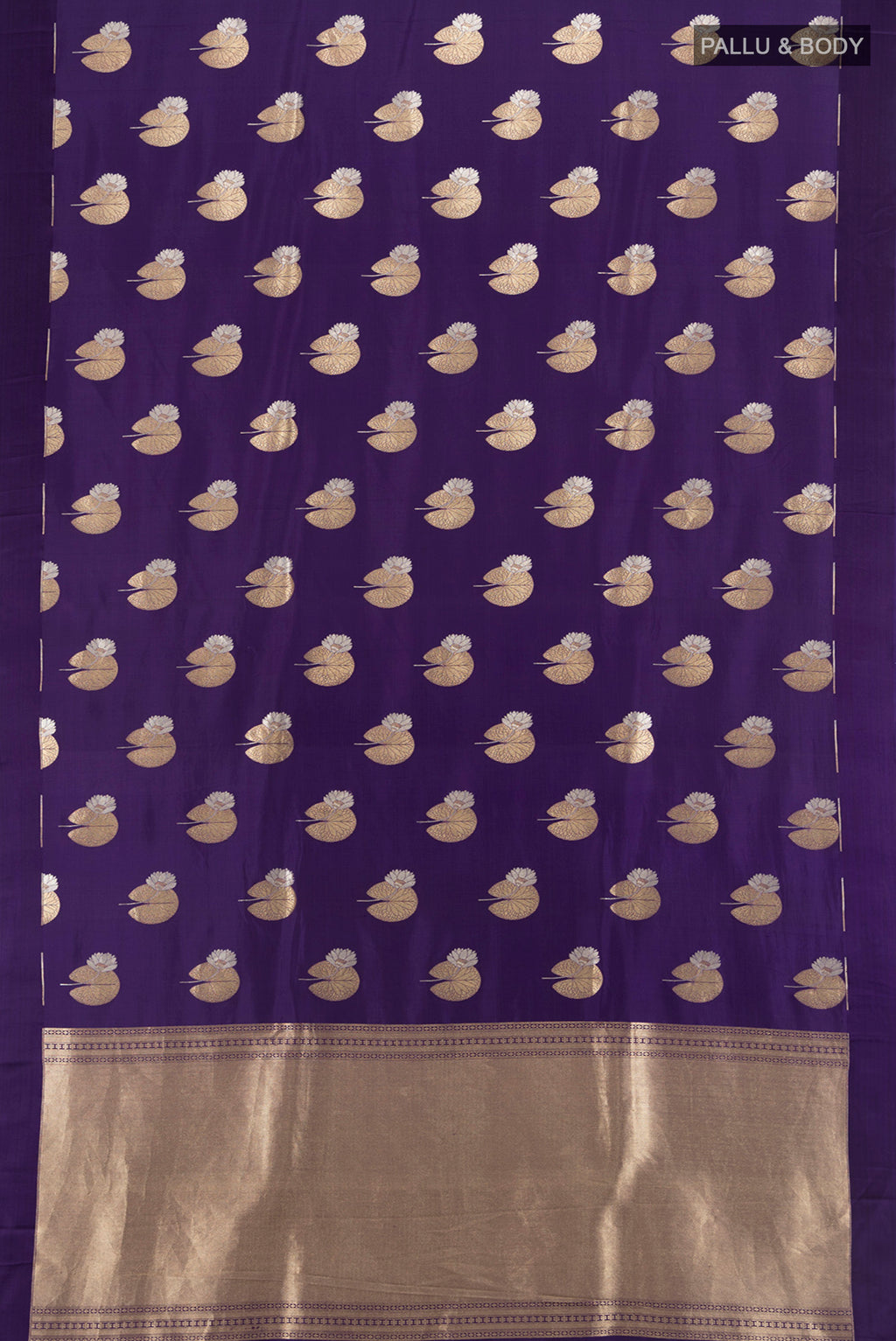 Flat view of Violet Banarasi Silk Saree with Zari Butta on the body and Plain Border. 