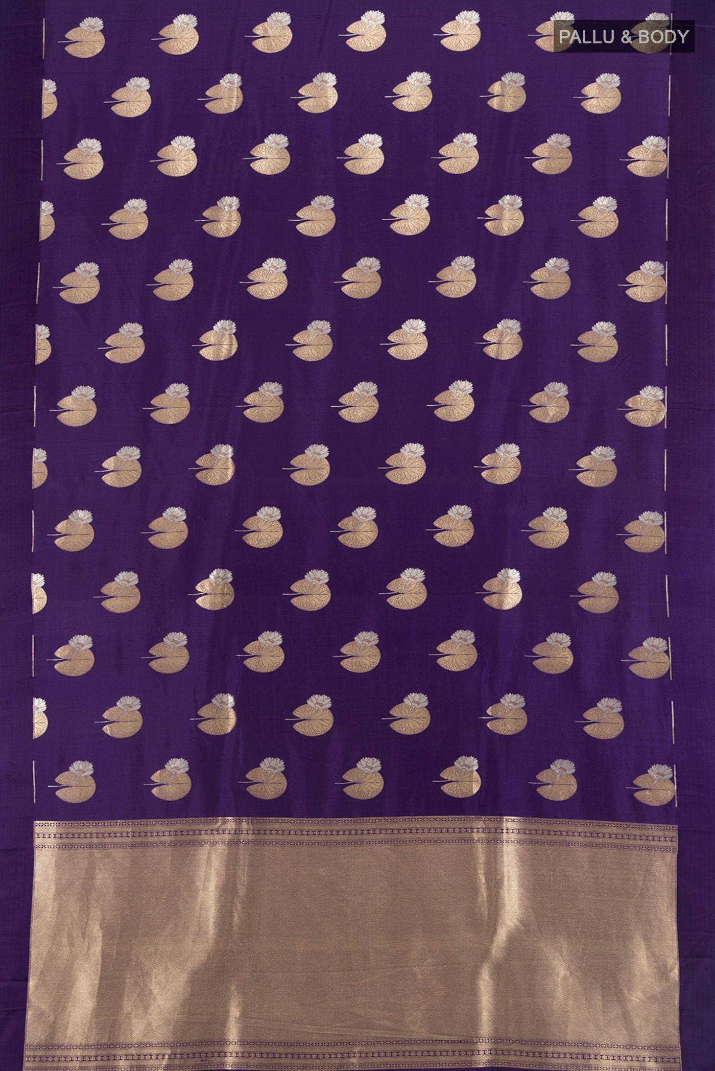 Flat view of Violet Banarasi Silk Saree with Zari Butta on the body and Plain Border. 