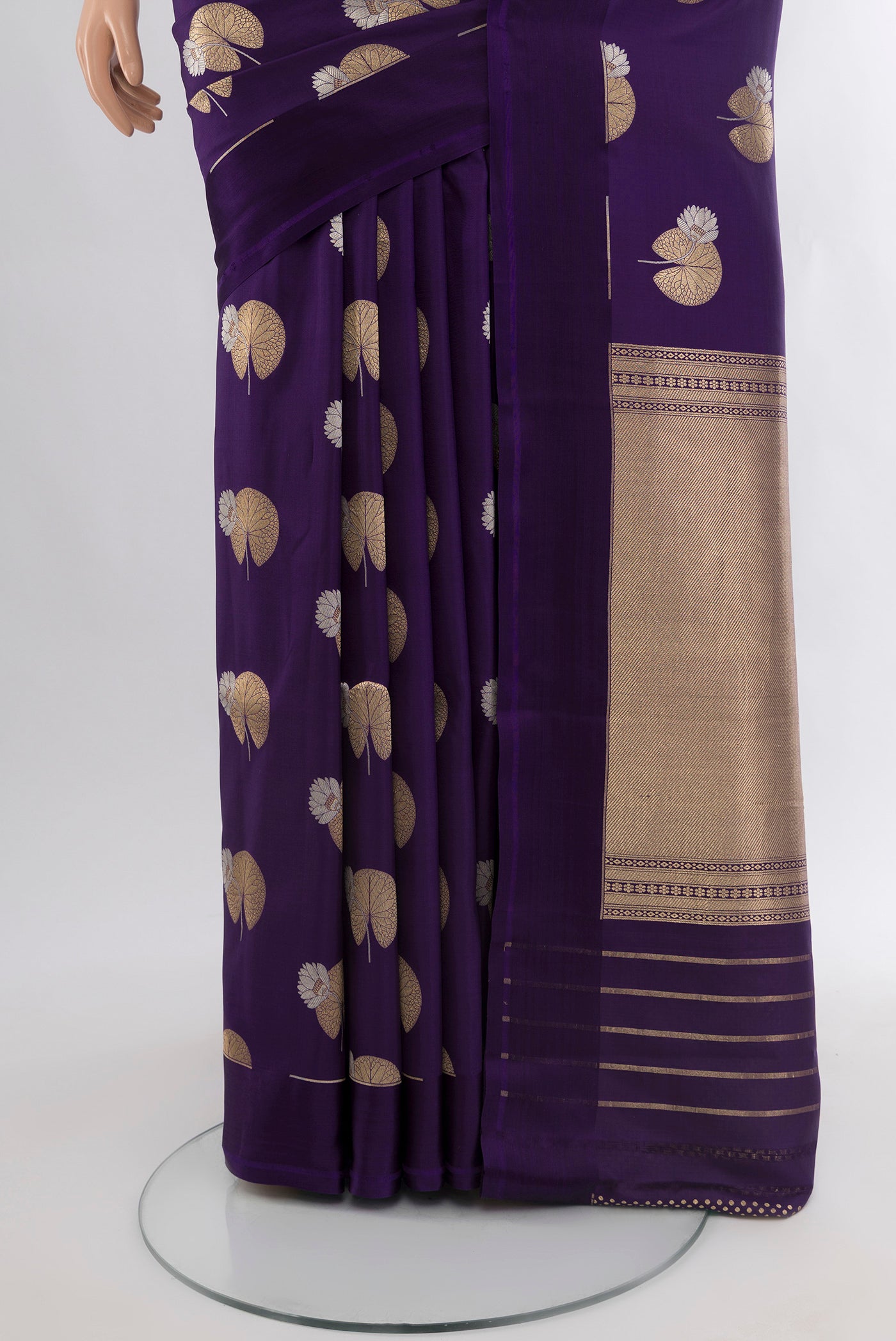 Pleats and pallu of Violet Banarasi Silk Saree with Zari Butta on the body and Plain Border. 