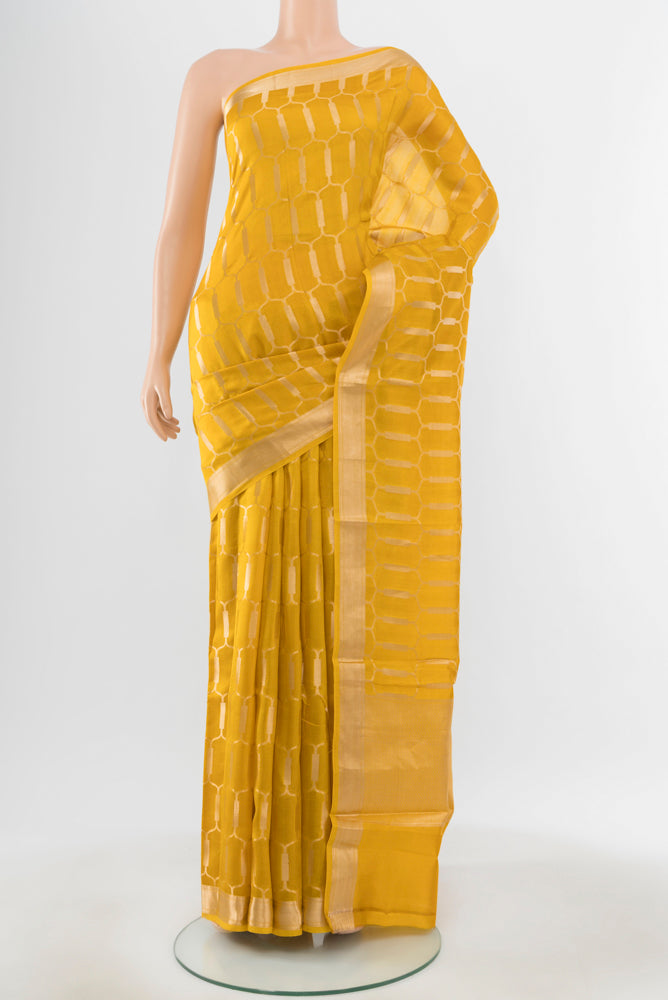Pure Silk Pure Zari Mustard Banarasi Raw Saree with Zari Butta on the body and Silk Border.  displayed on a mannequin