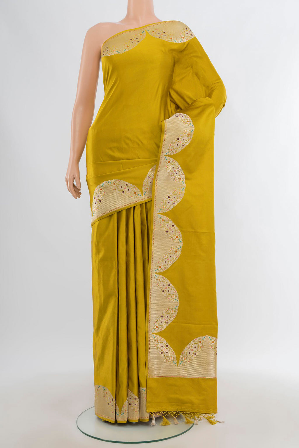 Pure Silk Pure Zari Mehandi Green Banarasi Saree with Plain Body and Fancy Border.  displayed on a mannequin