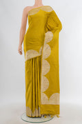Pure Silk Pure Zari Mehandi Green Banarasi Saree with Plain Body and Fancy Border.  displayed on a mannequin
