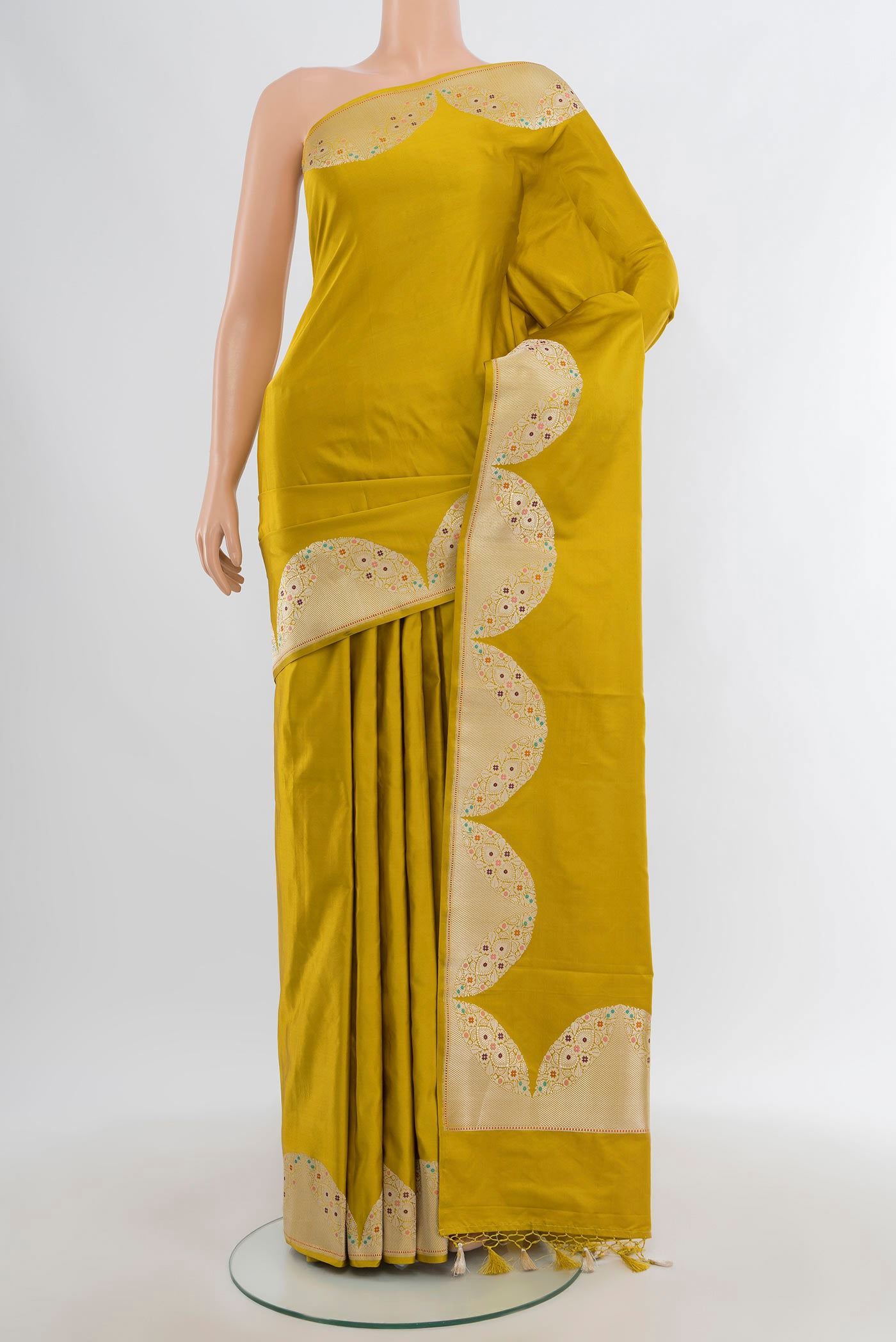 Pure Silk Pure Zari Mehandi Green Banarasi Saree with Plain Body and Fancy Border.  displayed on a mannequin