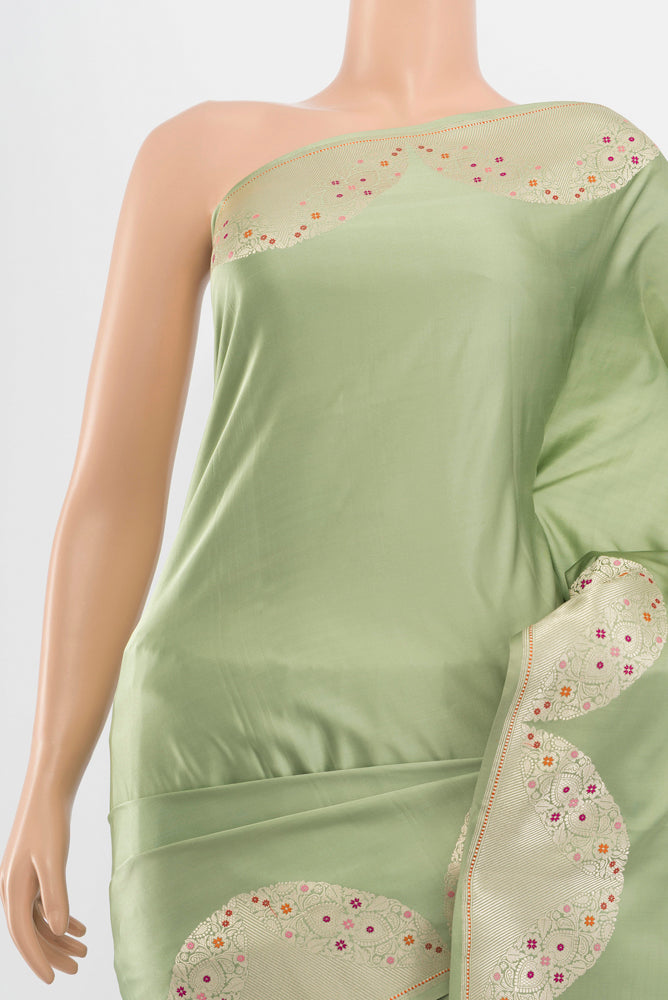 Border image of Pure Silk Pure Zari Pista Green Banarasi Saree with Zari Butta on the body and Silk Border. 
