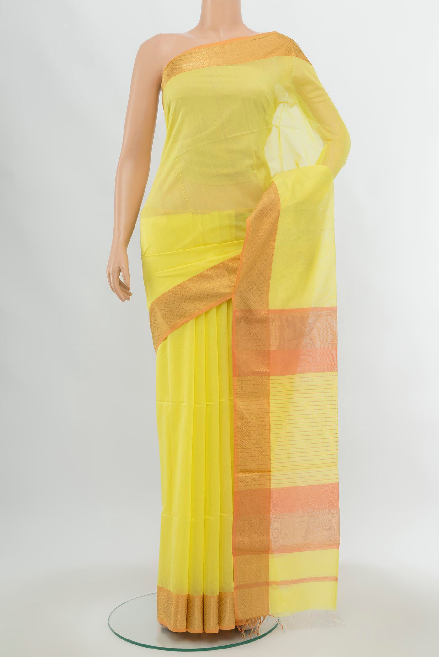 Lemon Yellow Maheshwari Silk Cotton Saree with Plain Body and Fancy Border.  displayed on a mannequin
