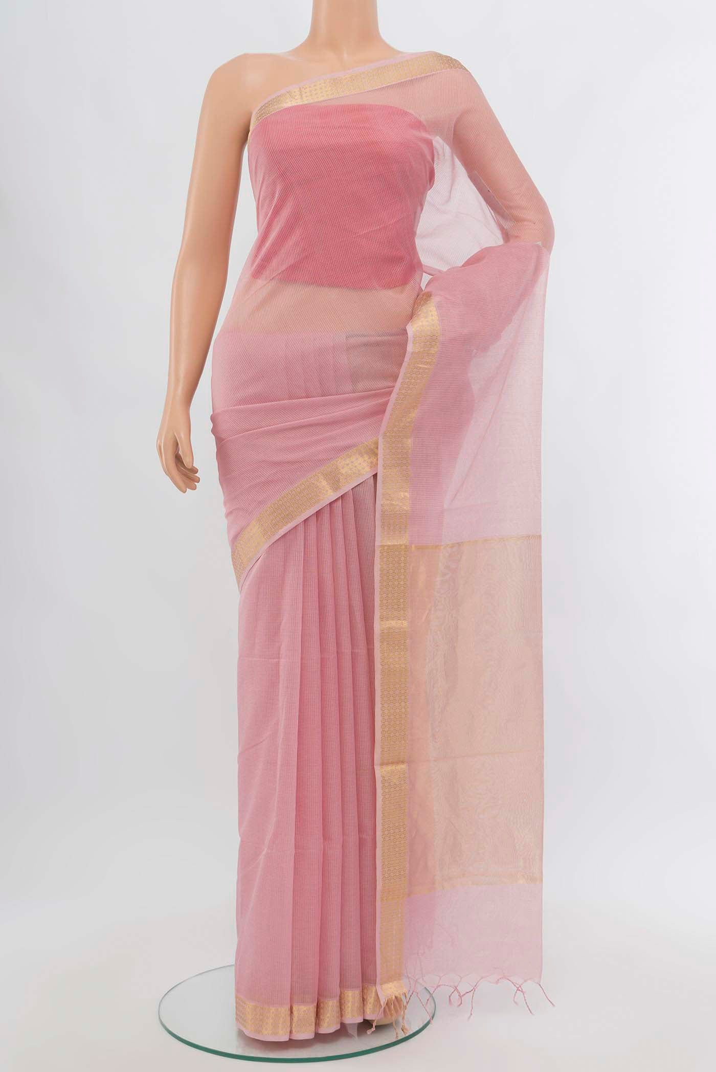 Rose Gold Maheshwari Silk Cotton Saree with Zari Butta on the body and Silk Border displayed on a mannequin