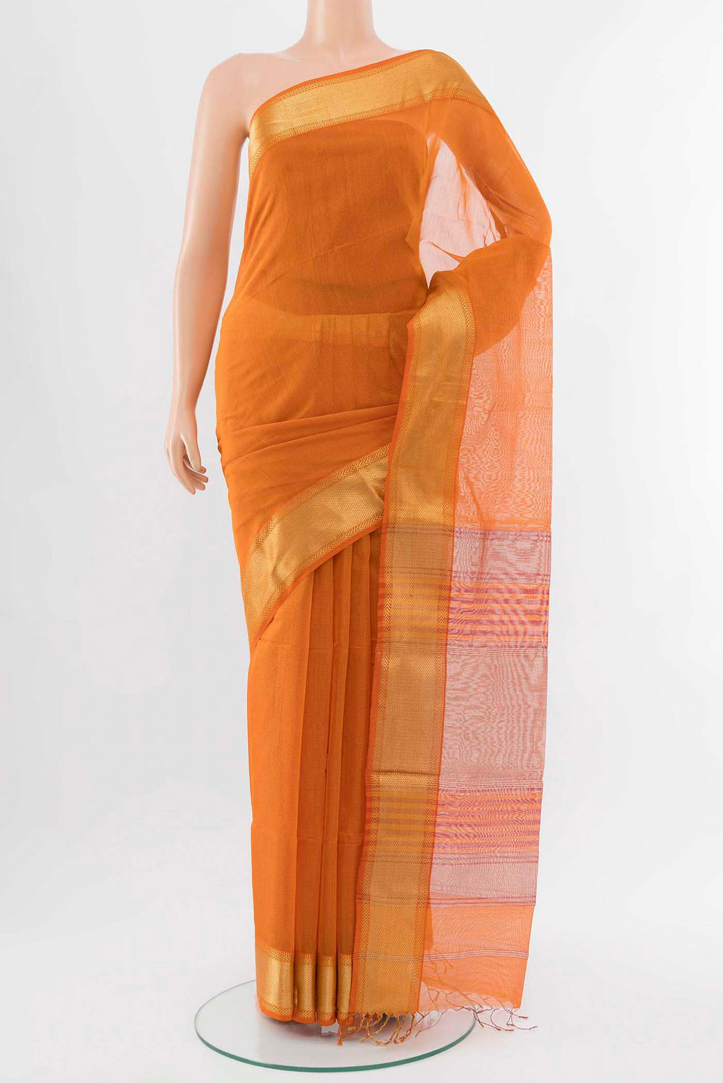 Orange Maheshwari Silk Cotton Saree with Zari Butta on the body and Silk Border displayed on a mannequin