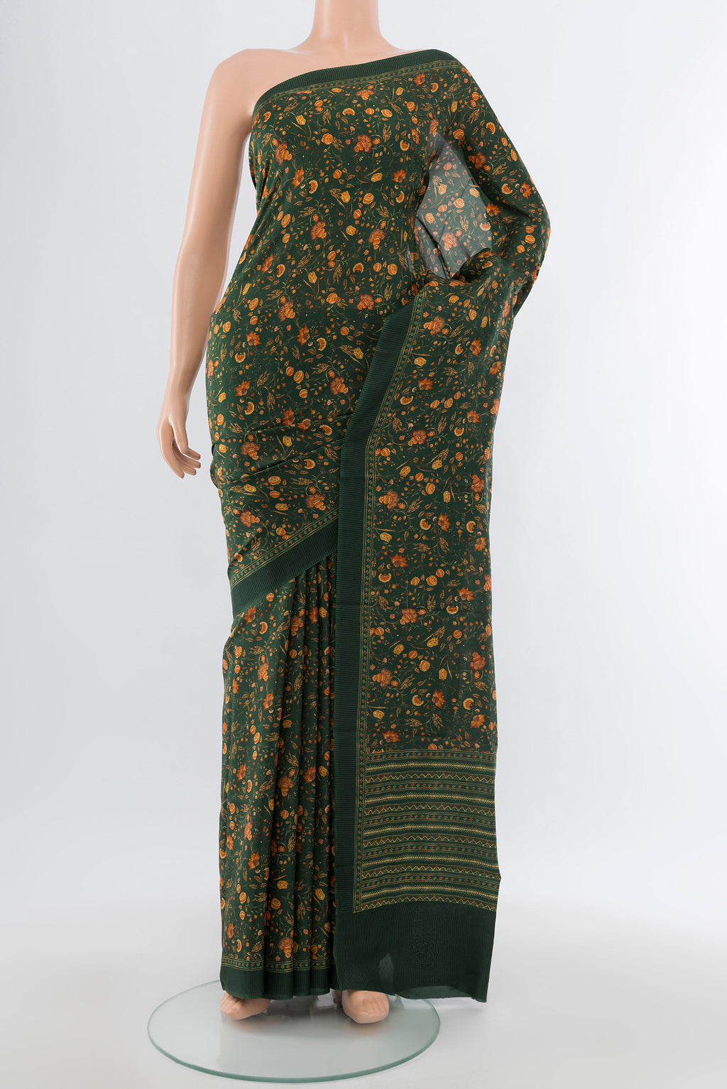 Bottle Green Printed Silk Saree with Floral Print on the body and Silk Border.  displayed on a mannequin