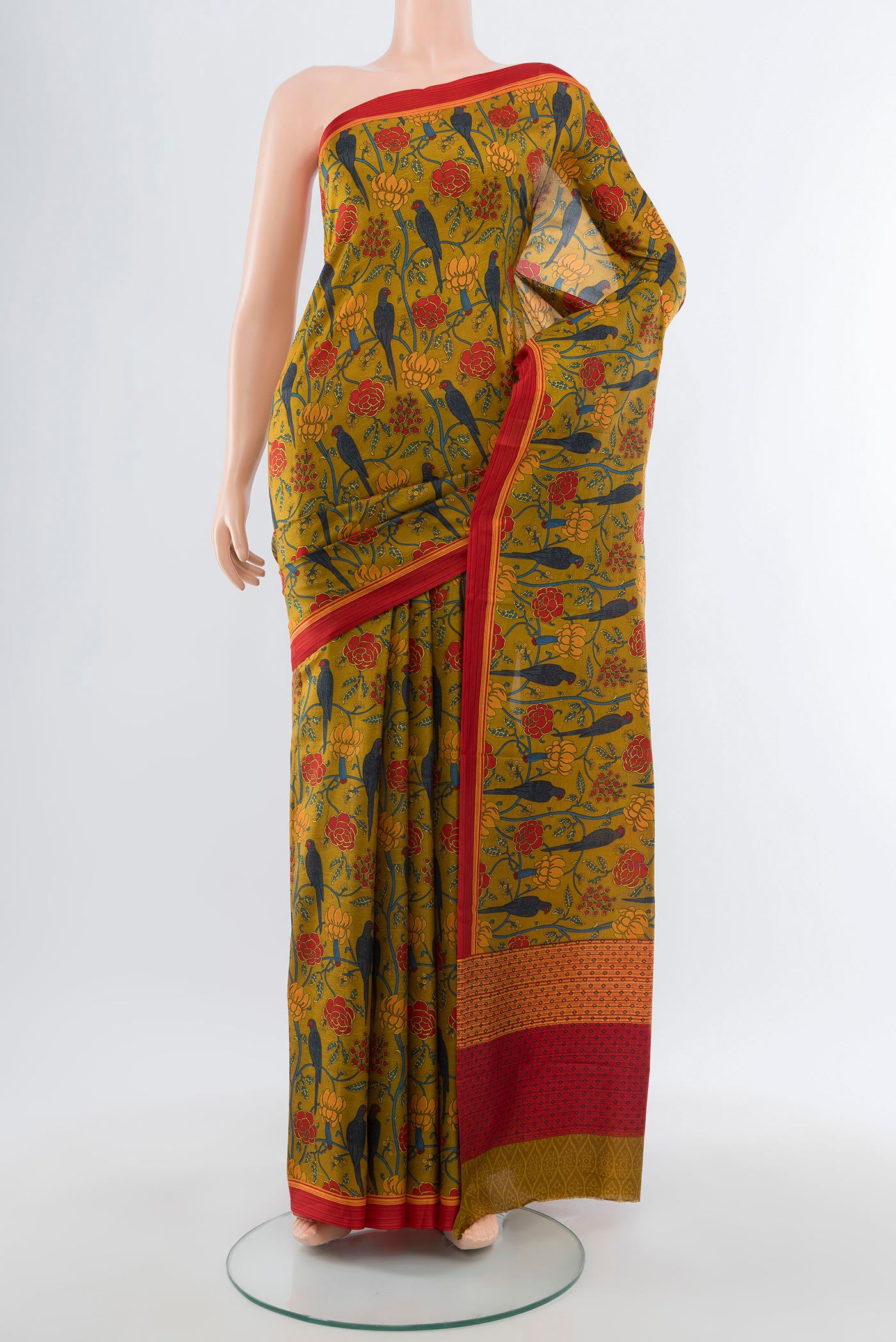 Mehandi Green Printed Silk Saree with Bird Print on the body and Plain Border.  displayed on a mannequin