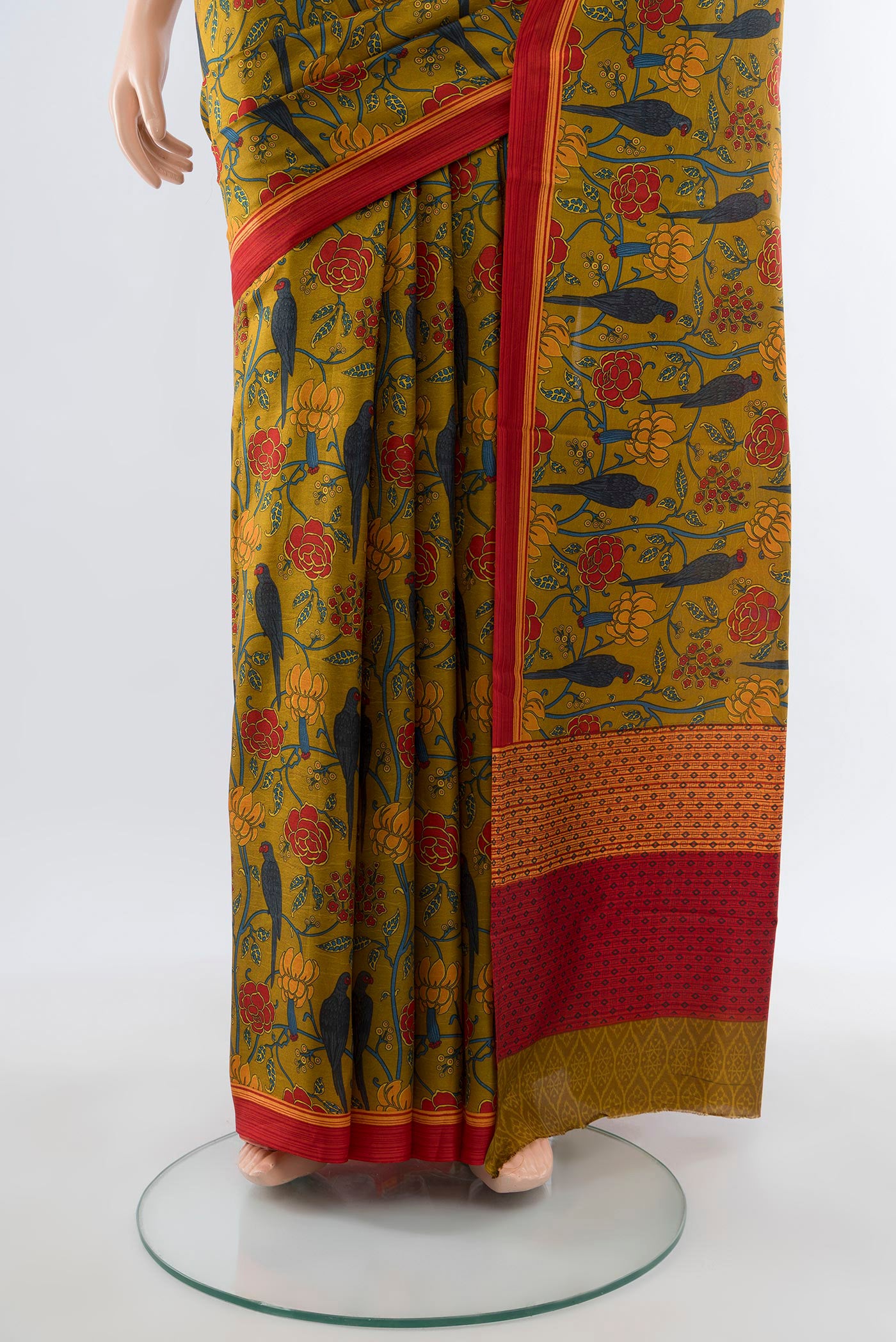 Pleats and pallu of Mehandi Green Printed Silk Saree with Bird Print on the body and Plain Border. 