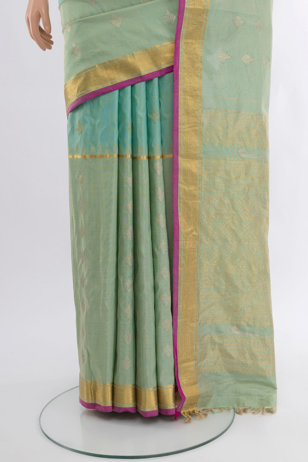 Pleats and pallu of Sky Blue Gadwal Silk Saree with Zari Butta on the body and Zari Border. 