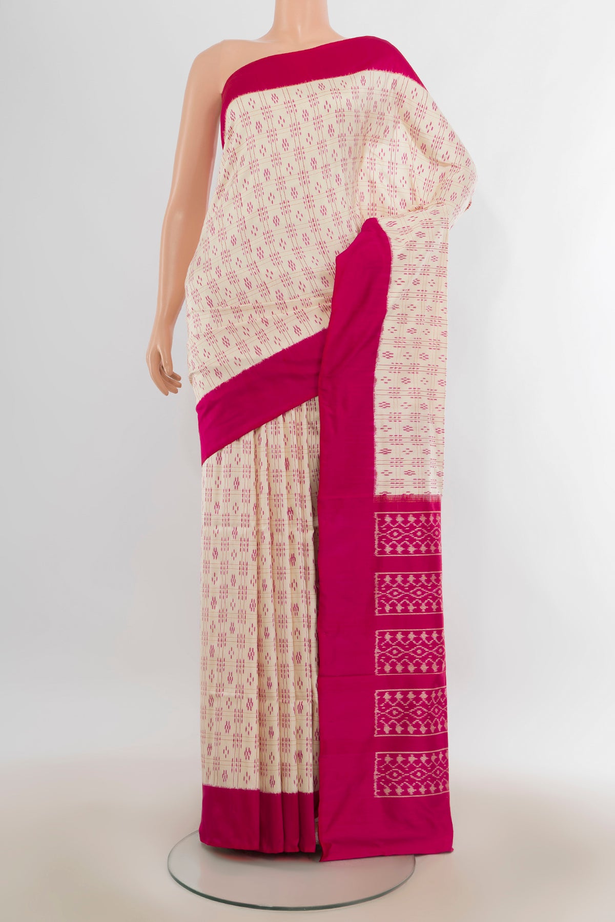 Pure Silk Cream Pochampally Saree with Pure Ikat on the body and Plain Border.  displayed on a mannequin