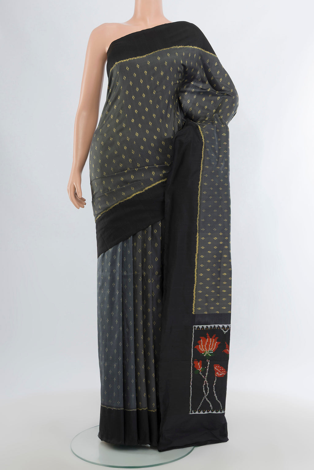 Davys Grey Pochampally Silk Saree with Pure Ikat on the body and Plain Border.  displayed on a mannequin