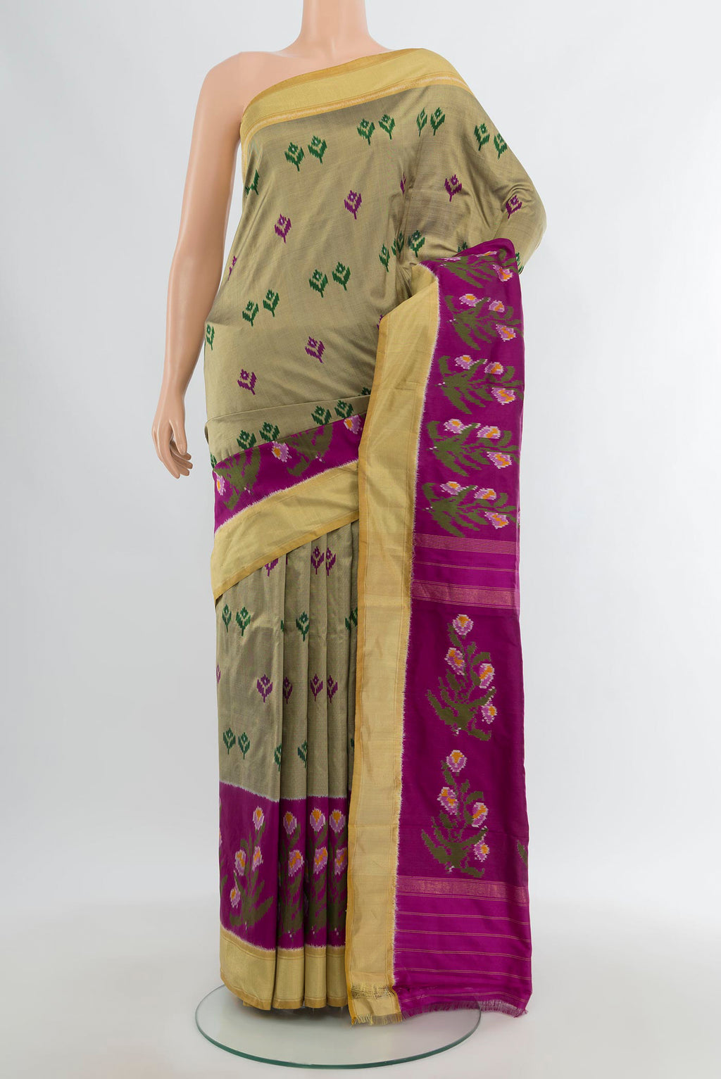 Dark Beige Pochampally Silk Saree with Pure Ikat on the body and Ikat Border.  displayed on a mannequin