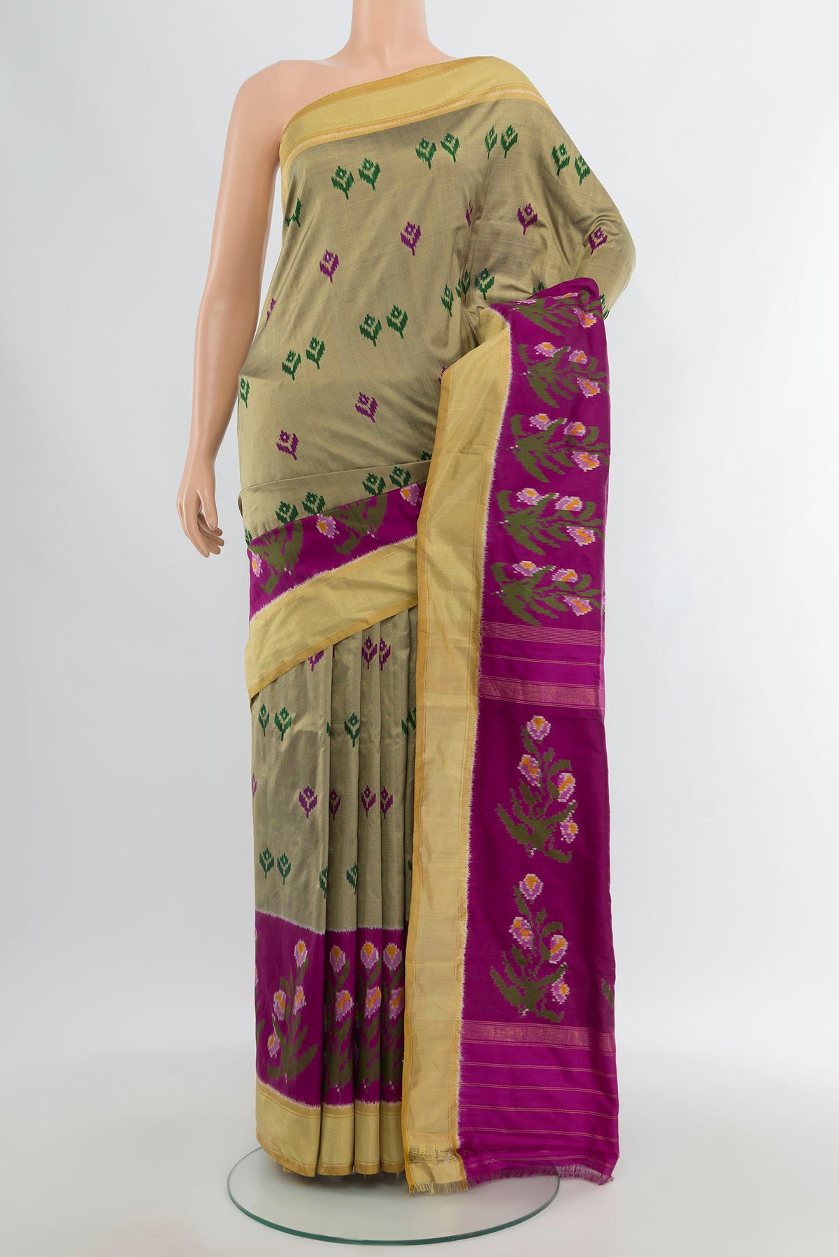 Dark Beige Pochampally Silk Saree with Pure Ikat on the body and Ikat Border.  displayed on a mannequin