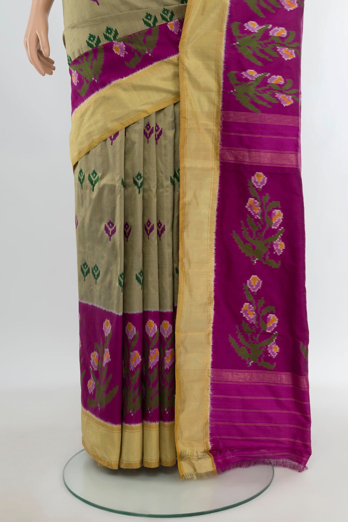 Pleats and pallu of Dark Beige Pochampally Silk Saree with Pure Ikat on the body and Ikat Border. 