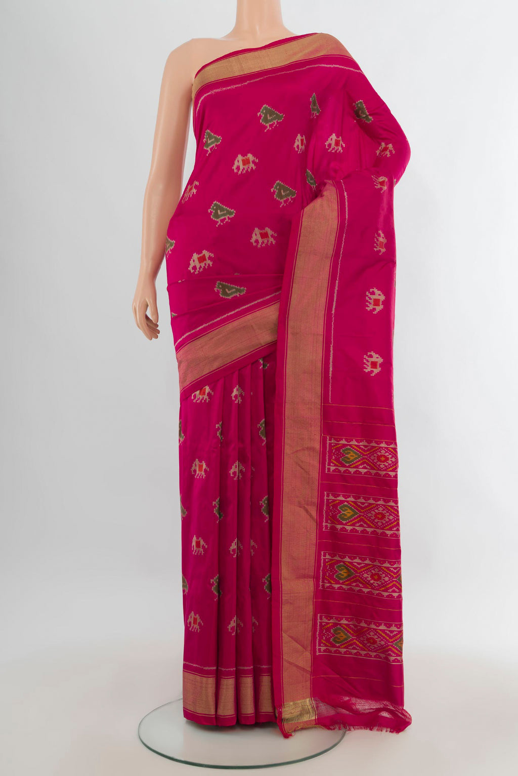 Pure Silk Dark Pink Pochampally Saree with Pure Ikat on the body and Zari Border.  displayed on a mannequin