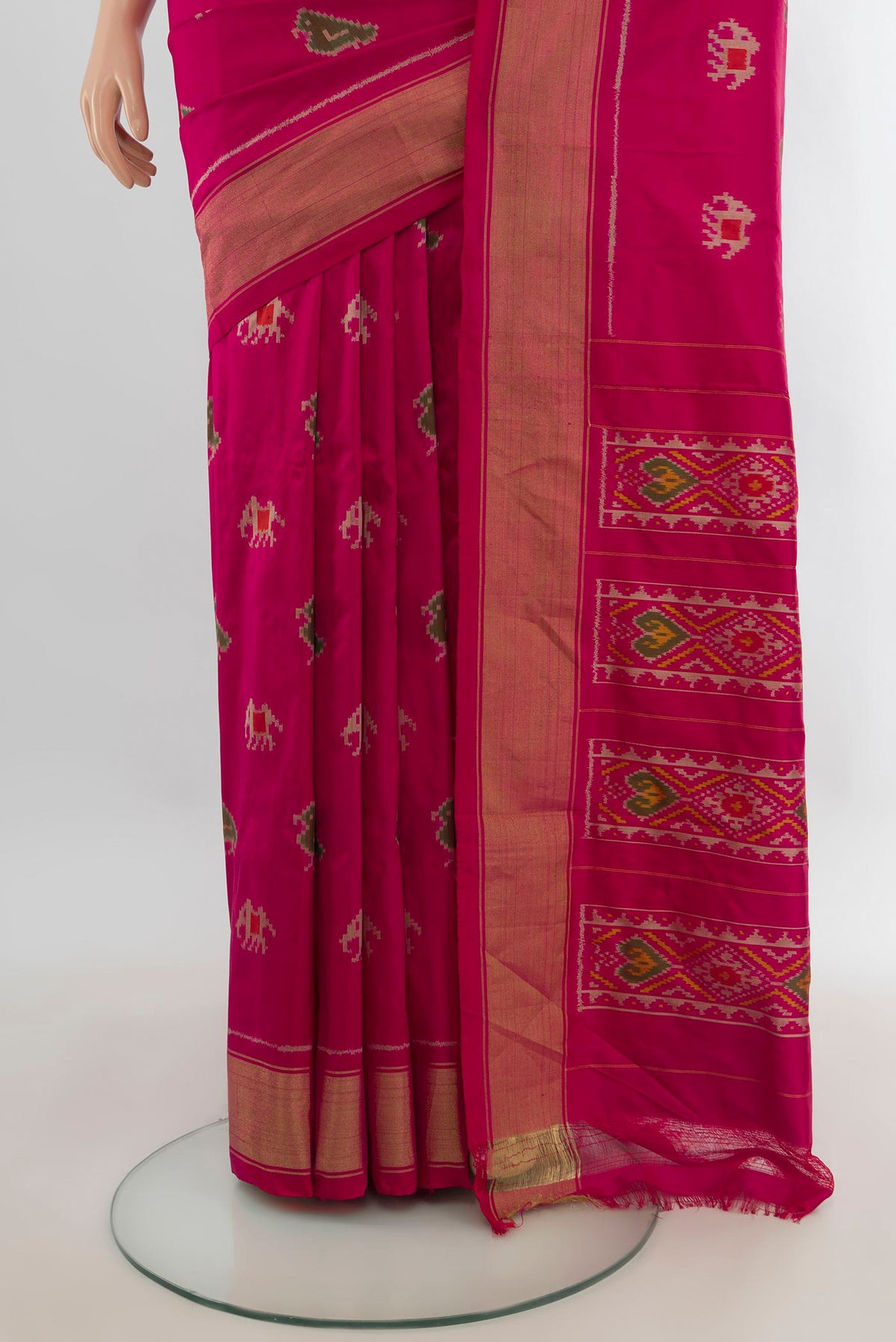 Pleats and pallu of Pure Silk Dark Pink Pochampally Saree with Pure Ikat on the body and Zari Border. 