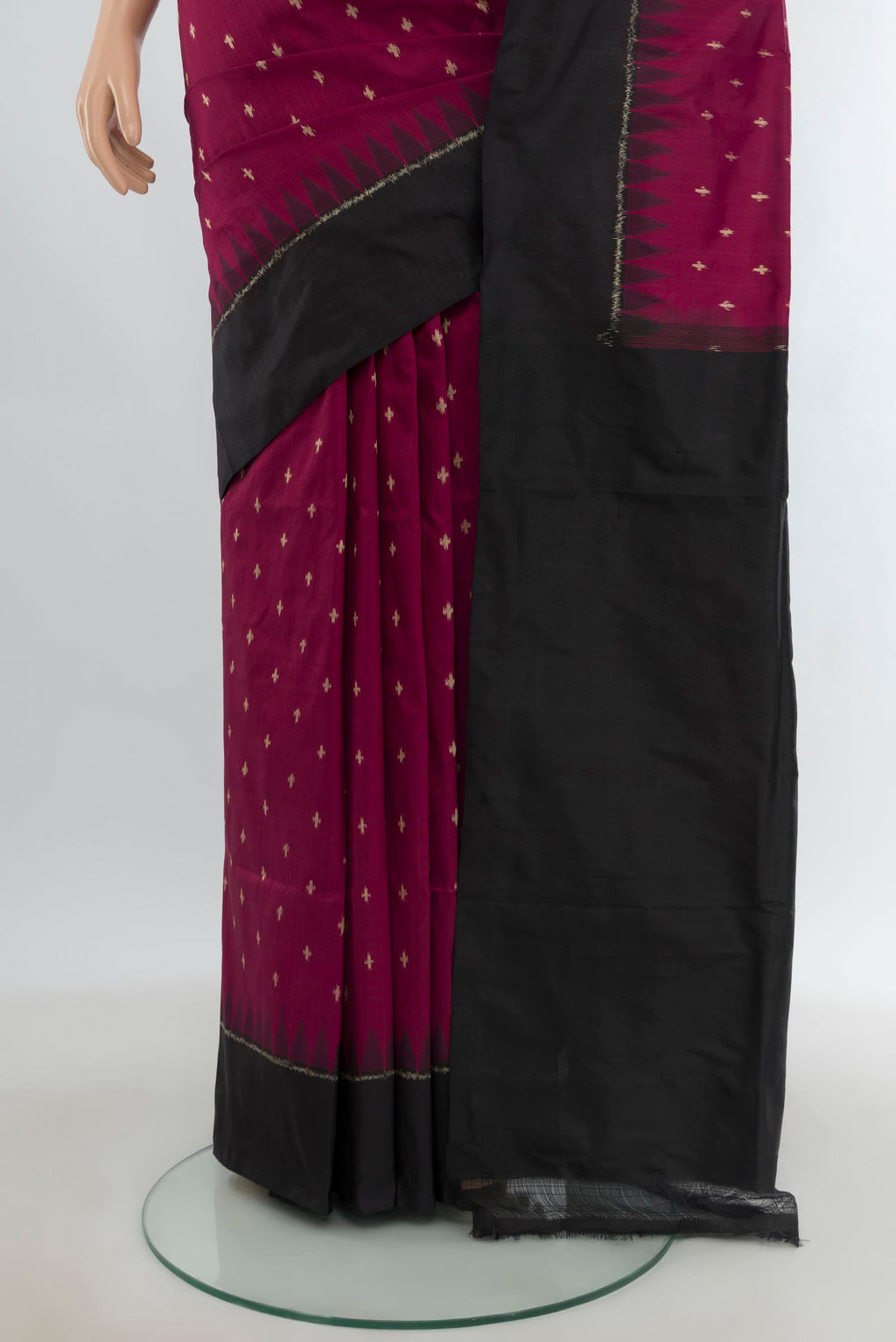 Pleats and pallu of Maroon Pochampally Silk Saree with Pure Ikat on the body and Plain Border. 