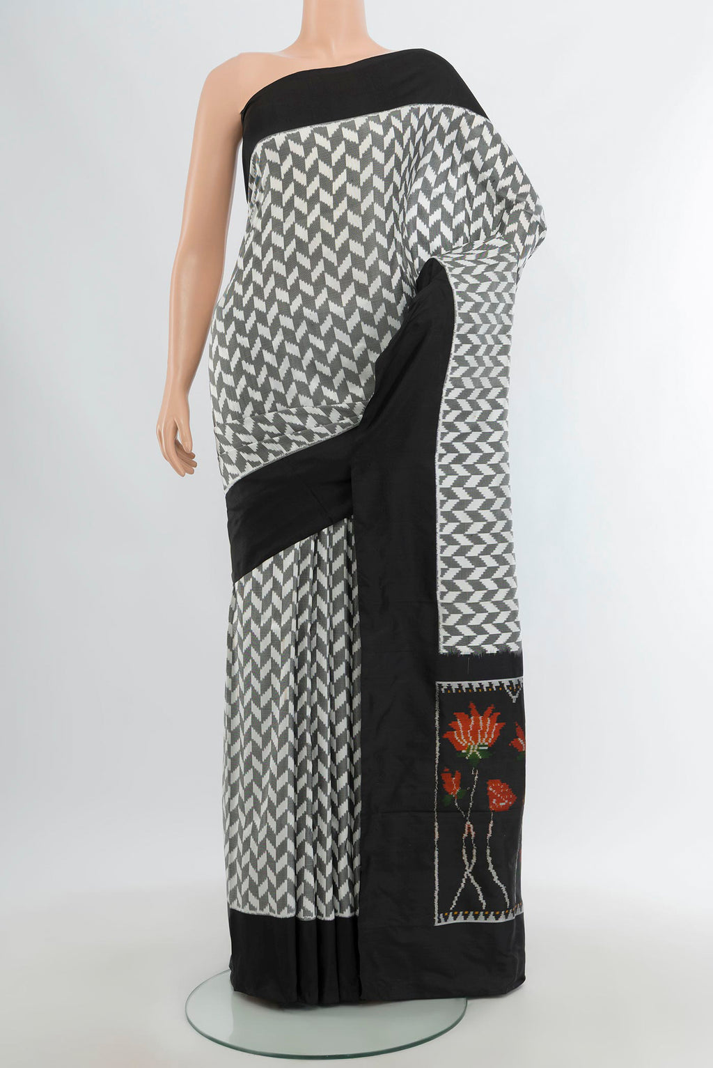 Multi Color Pochampally Silk Saree with Pure Ikat on the body and Plain Border.  displayed on a mannequin