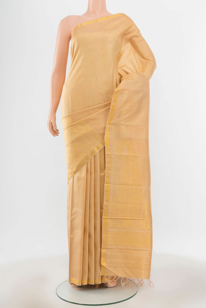 Pure Silk Pure Zari Cream Kanchipuram Saree with Zari Butta on the body and Silk Border.  displayed on a mannequin