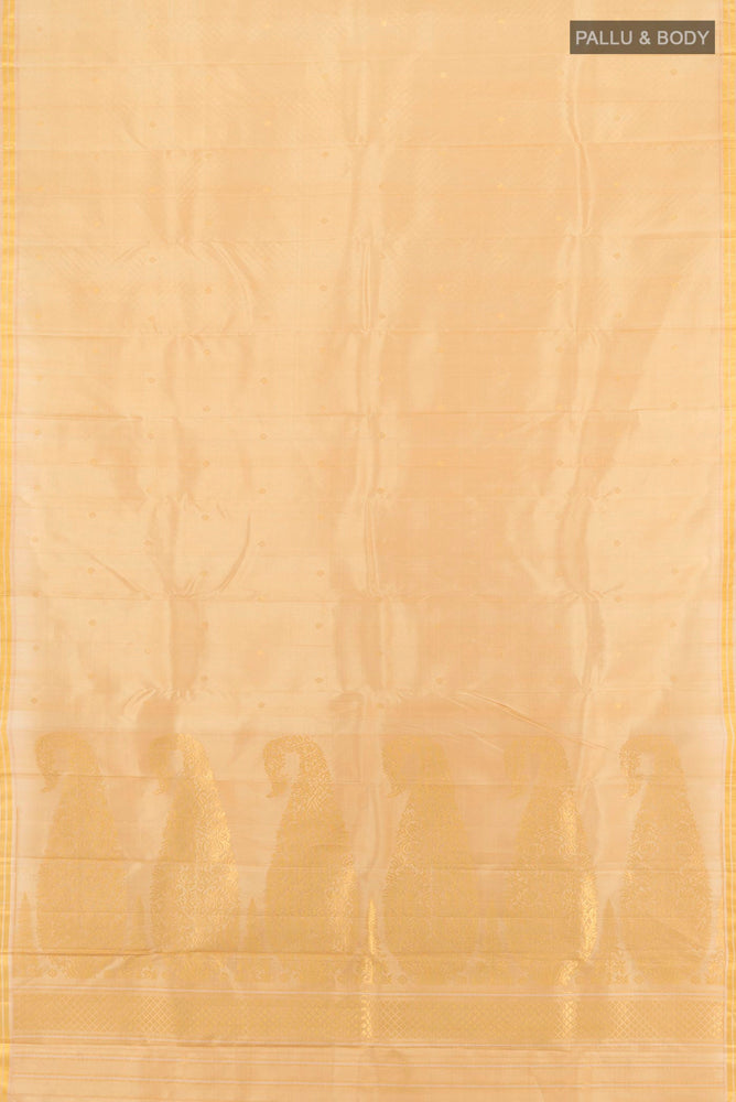 Flat view of Pure Silk Pure Zari Cream Kanchipuram Saree with Zari Butta on the body and Silk Border. 