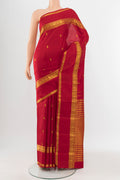 Red Kanjivaram Silk Saree with Zari Butta on the body and Silk Border.  displayed on a mannequin