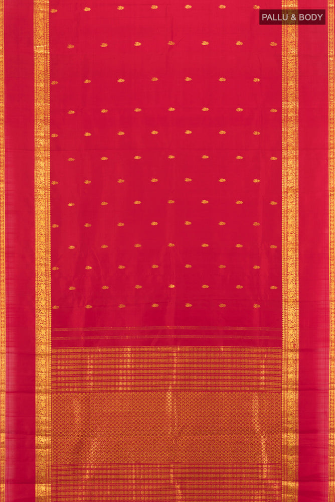 Flat view of Red Kanjivaram Silk Saree with Zari Butta on the body and Silk Border. 