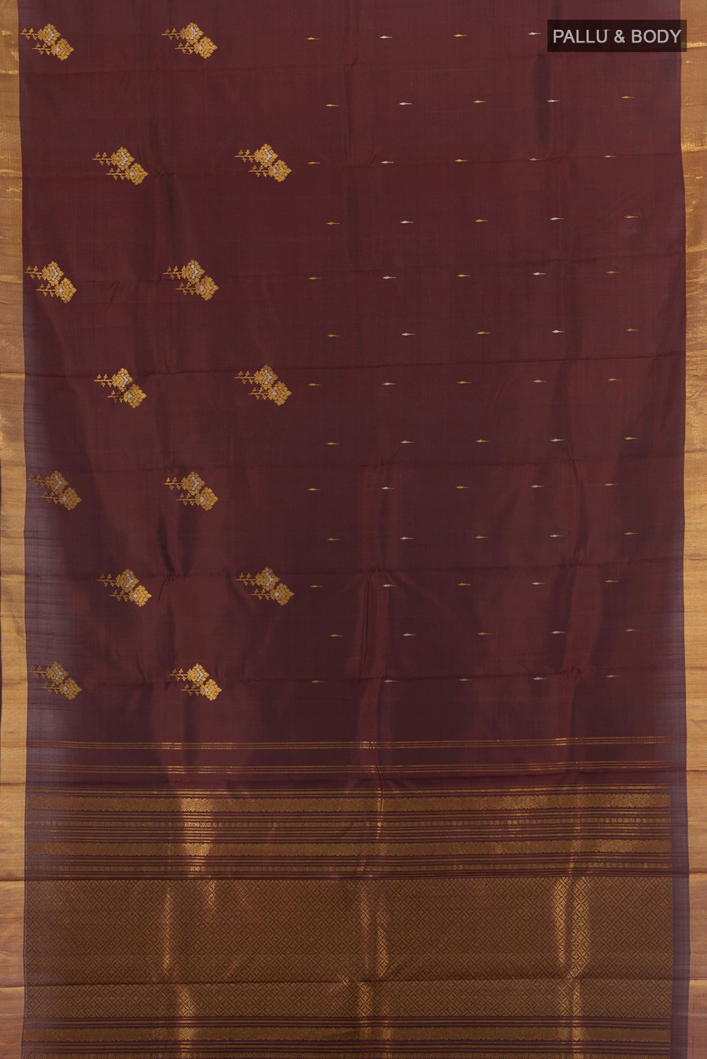 Flat view of Coffee Brown Kanjivaram Silk Saree with Zari Butta on the body and Zari Border. 