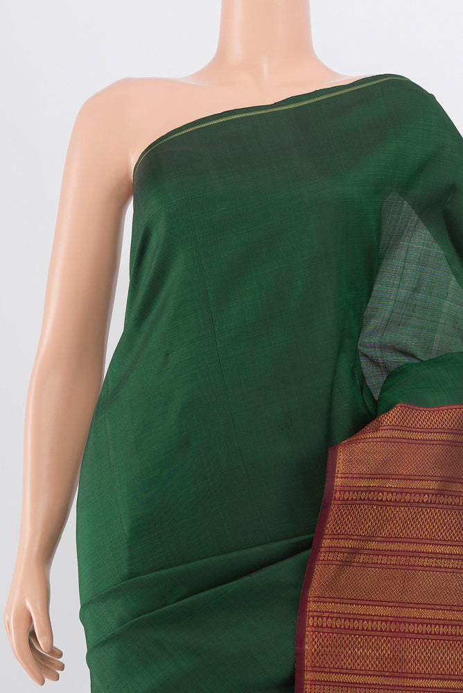 Border image of Pure Silk Pure Zari Bottle Green Kanjivaram Saree with Zari Butta on the body and Silk Border. 