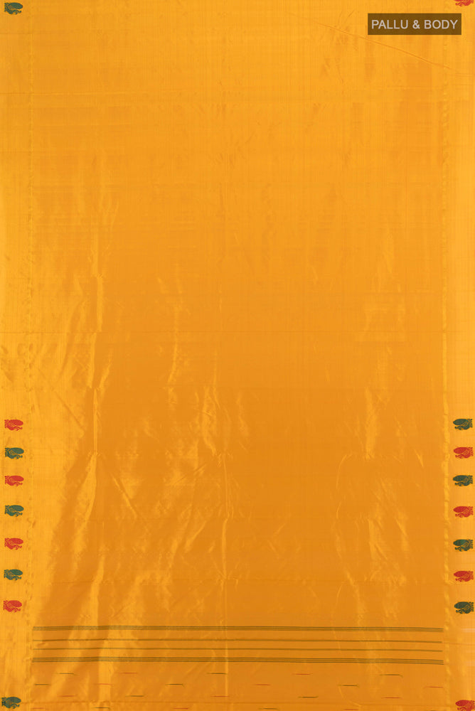 Flat view of Yellow Kanchipuram Silk Saree with Zari Butta on the body and Silk Border. 