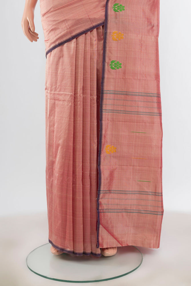 Pleats and pallu of Rose Gold Kanchipuram Silk Saree with Plain Body and Silk Border. 