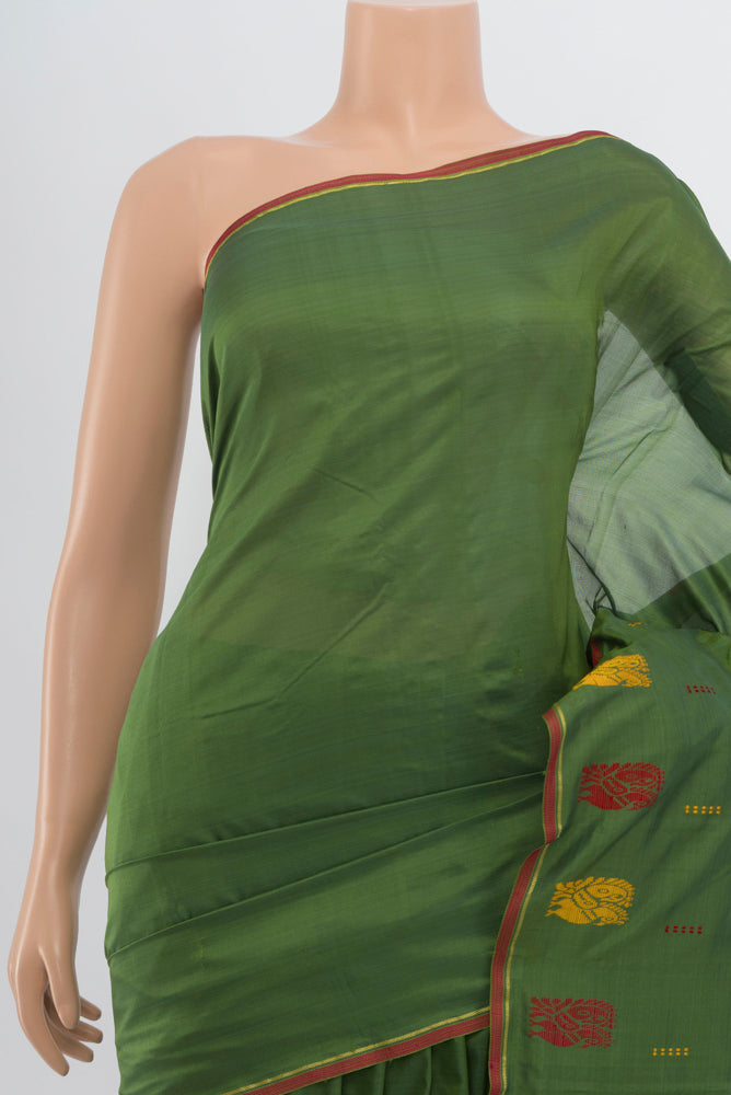 Border image of Light Green Kanchipuram Silk Saree with Plain Body and Zari Border. 