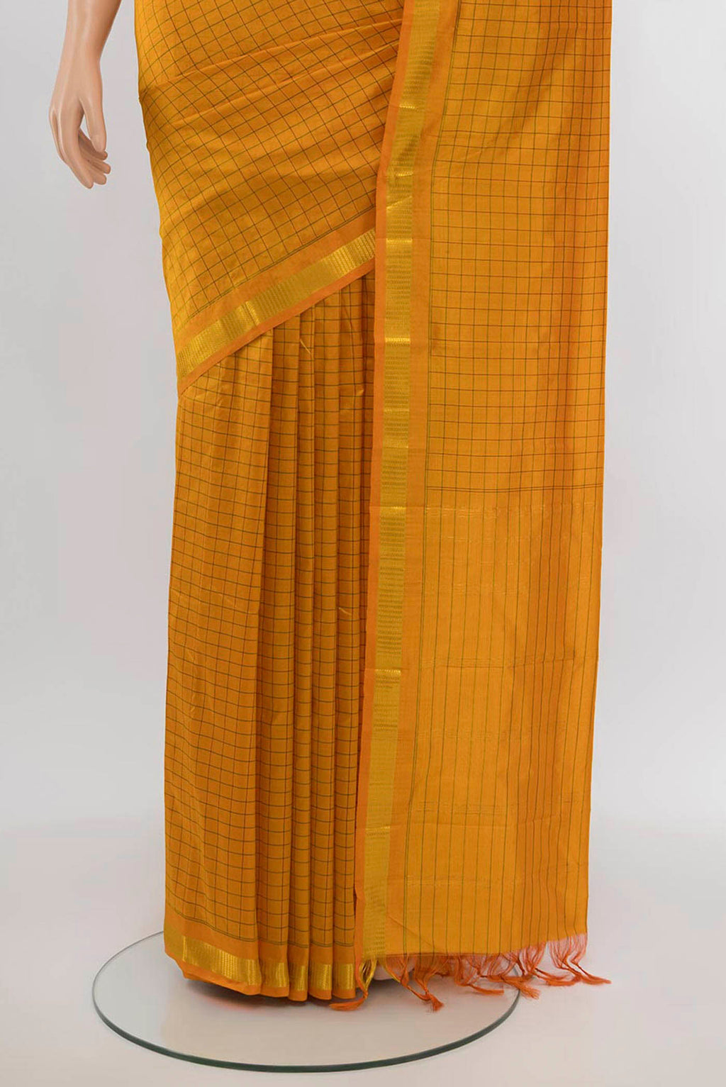 Pleats and pallu of Yellow Kanchipuram Silk Saree with Checked design on the body and Silk Border. 