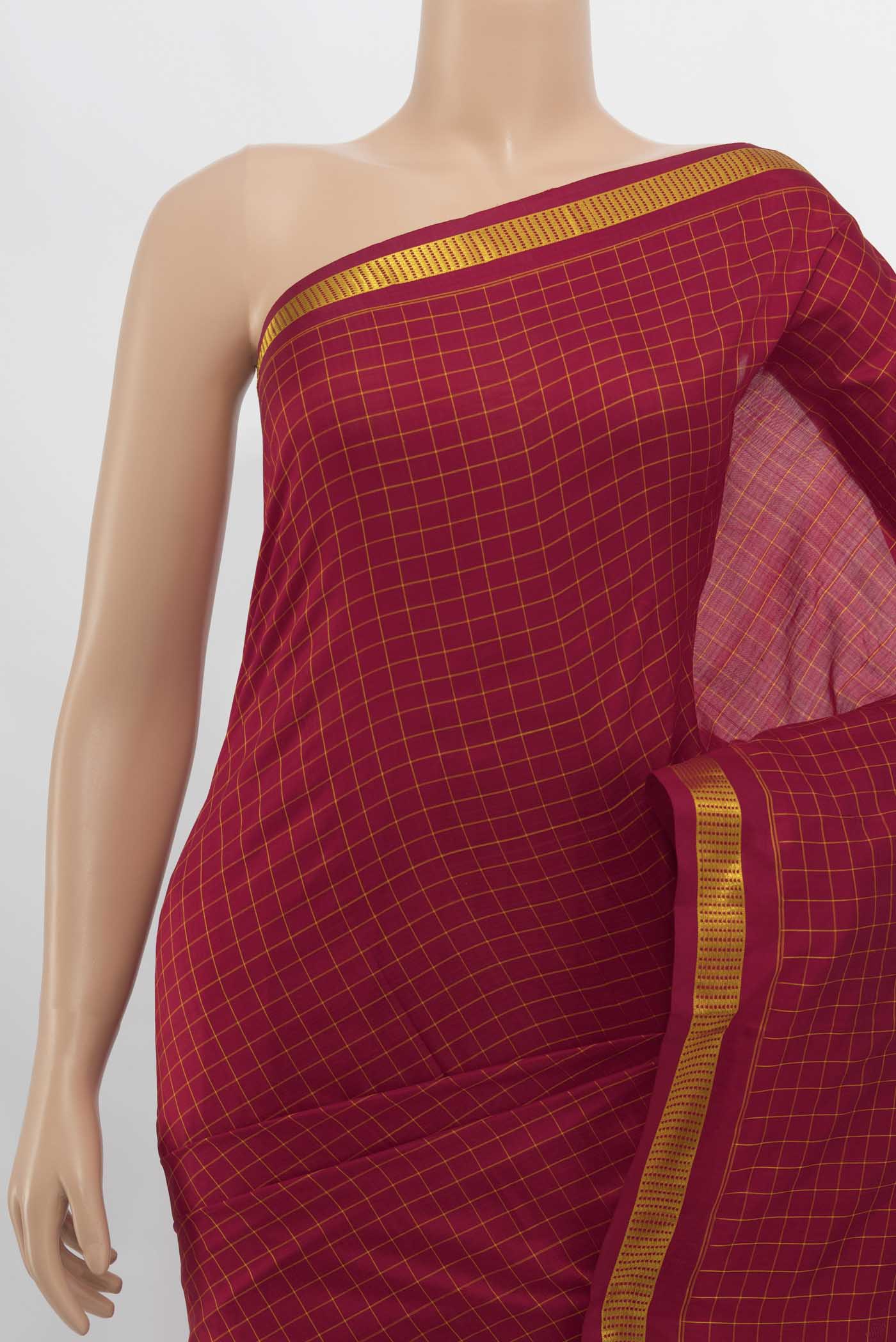 Border image of Maroon Kanchipuram Silk Saree with Checked design on the body and Silk Border. 