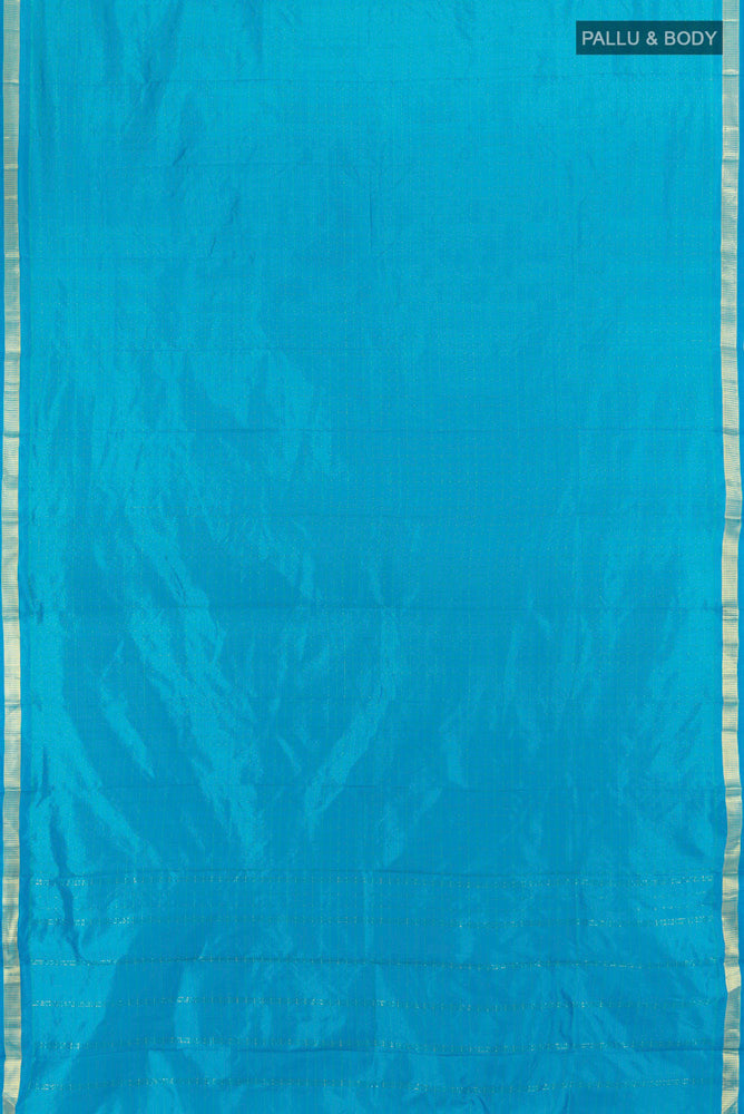 Flat view of Light Blue Kanchipuram Silk Saree with Checked design on the body and Zari Border. 