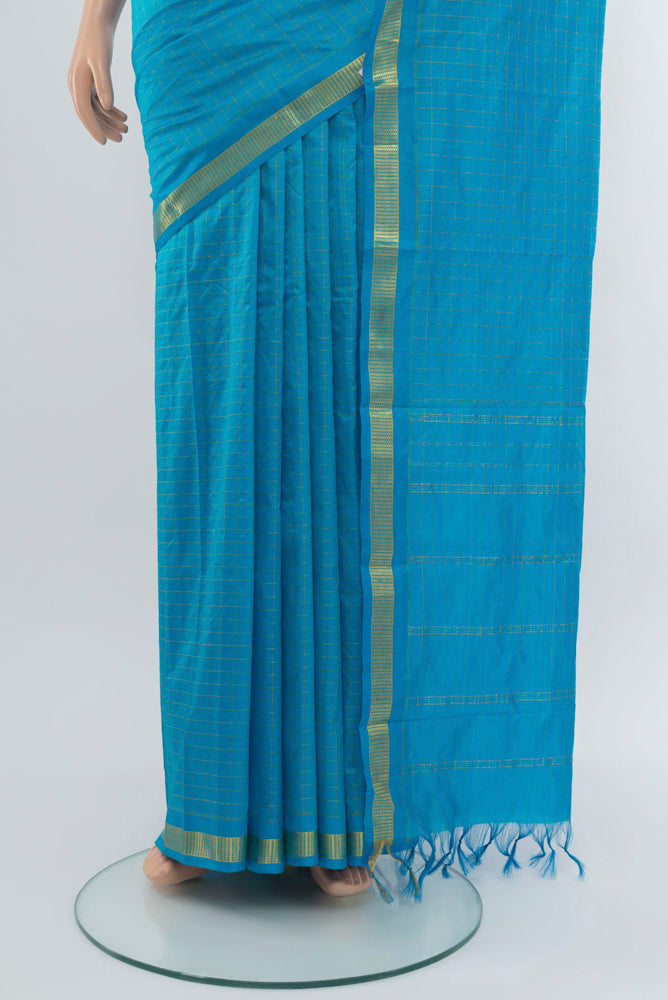 Pleats and pallu of Light Blue Kanchipuram Silk Saree with Checked design on the body and Zari Border. 