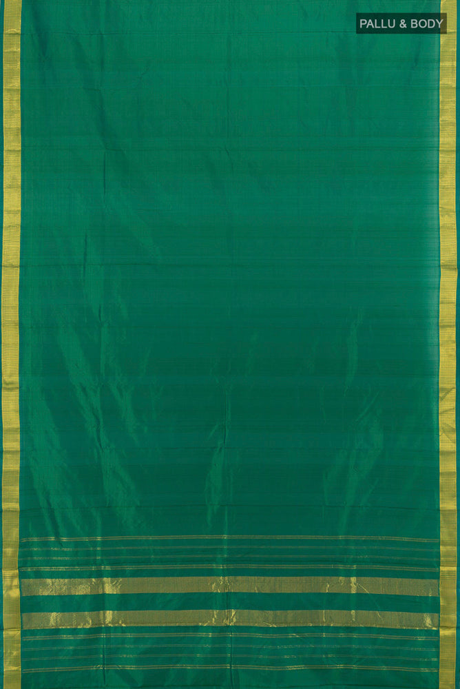 Flat view of Mint Green Kanjivaram Silk Saree with Zari Butta on the body and Silk Border. 