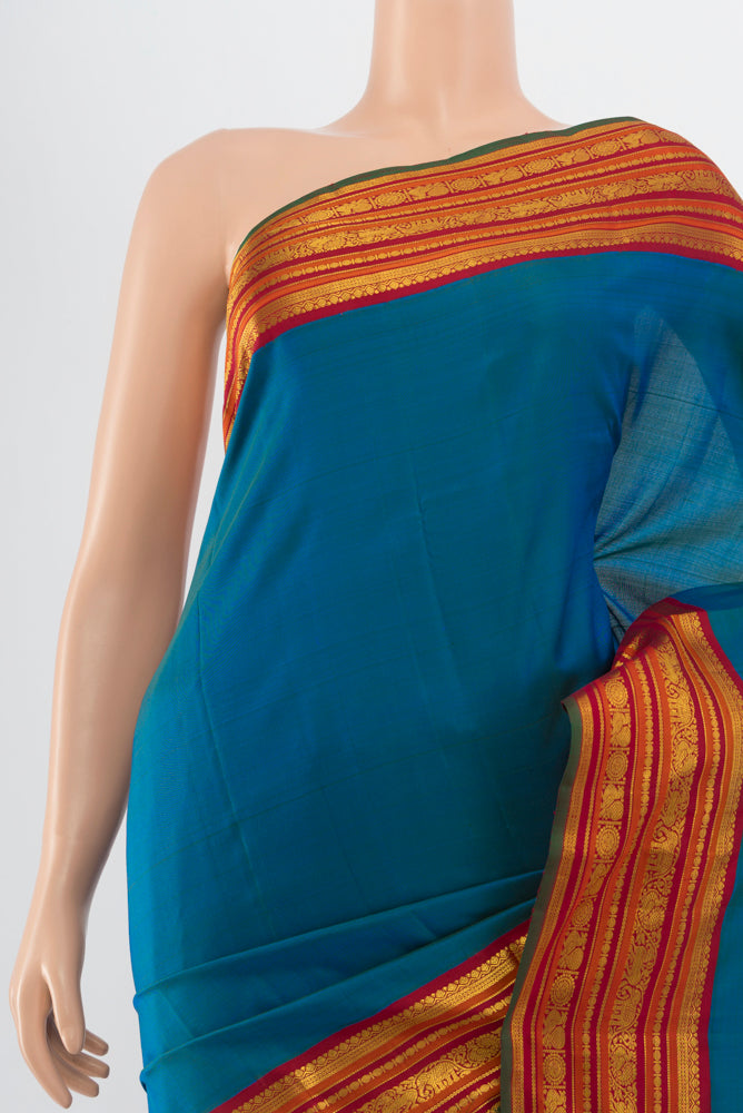 Border image of Pure Silk Pure Zari Peacock Blue Kanjivaram Saree with Zari Butta on the body and Silk Border. 
