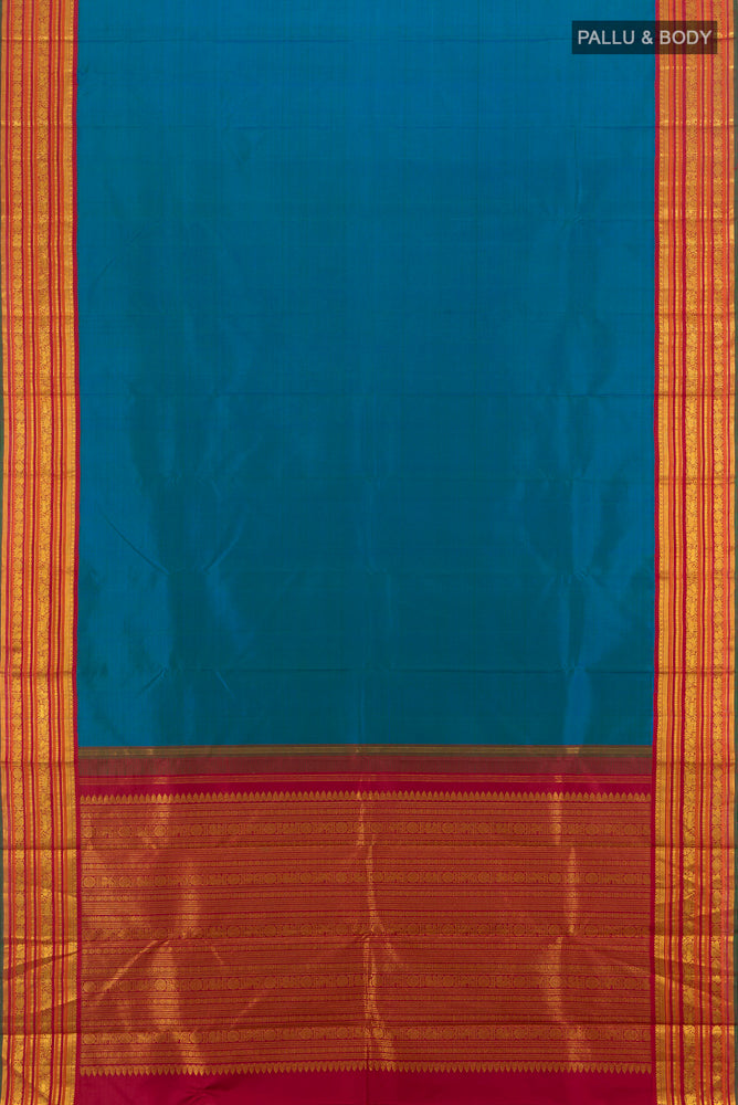 Flat view of Pure Silk Pure Zari Peacock Blue Kanjivaram Saree with Zari Butta on the body and Silk Border. 