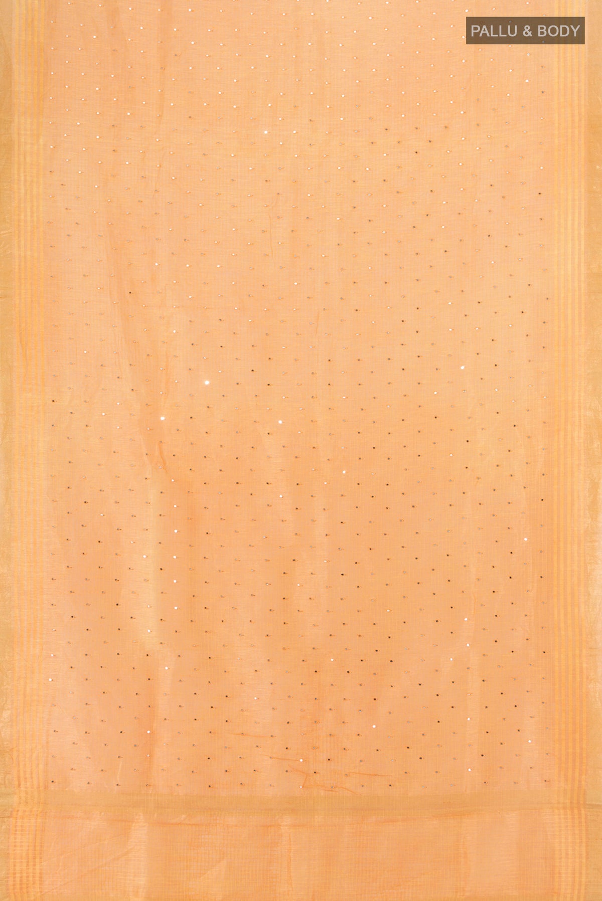 Flat view of Peach Tussar Silk Saree with Embroidery on the body and Zari Border. 