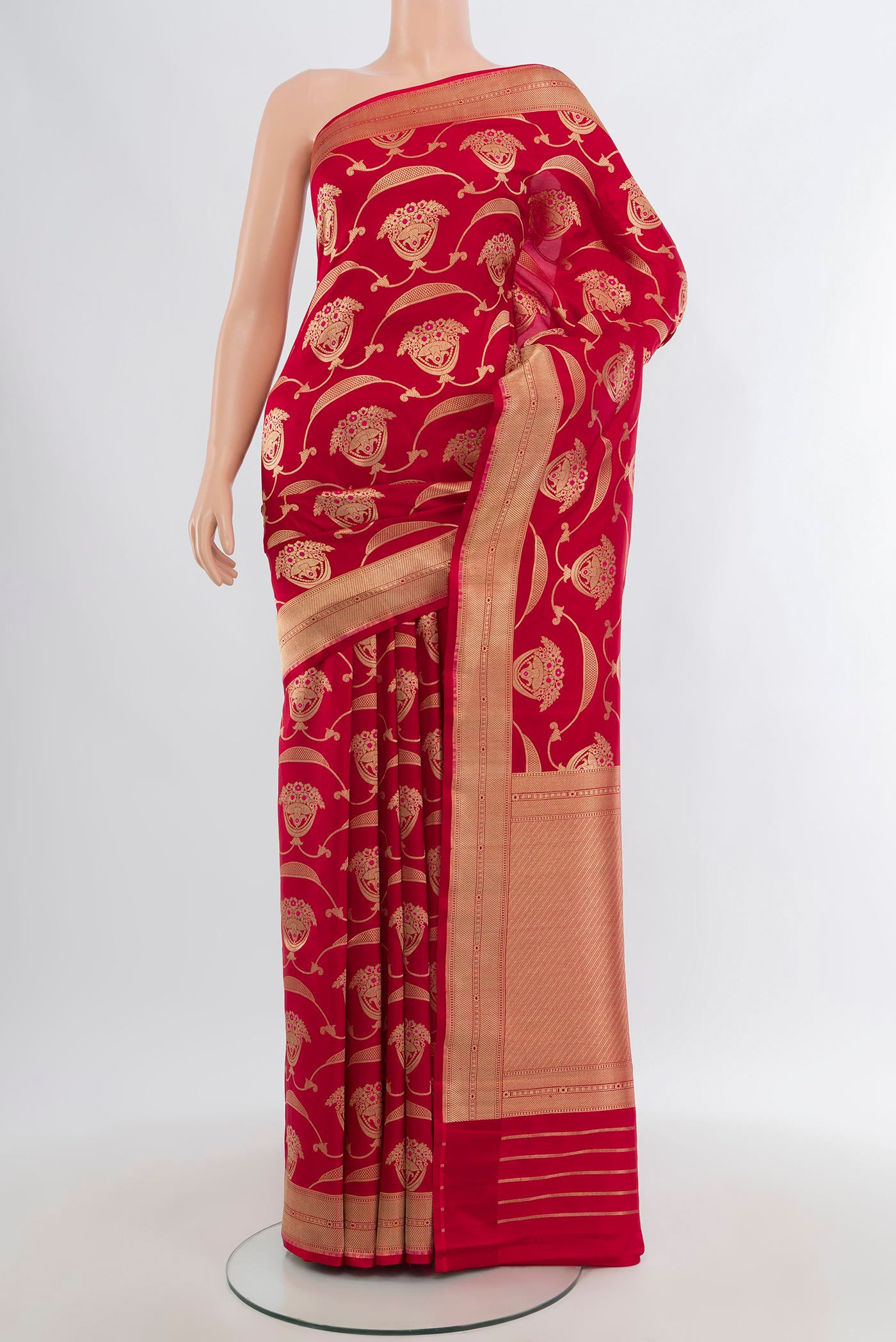 Red Banarasi Silk Saree with Zari Butta on the body and Zari Border.  displayed on a mannequin