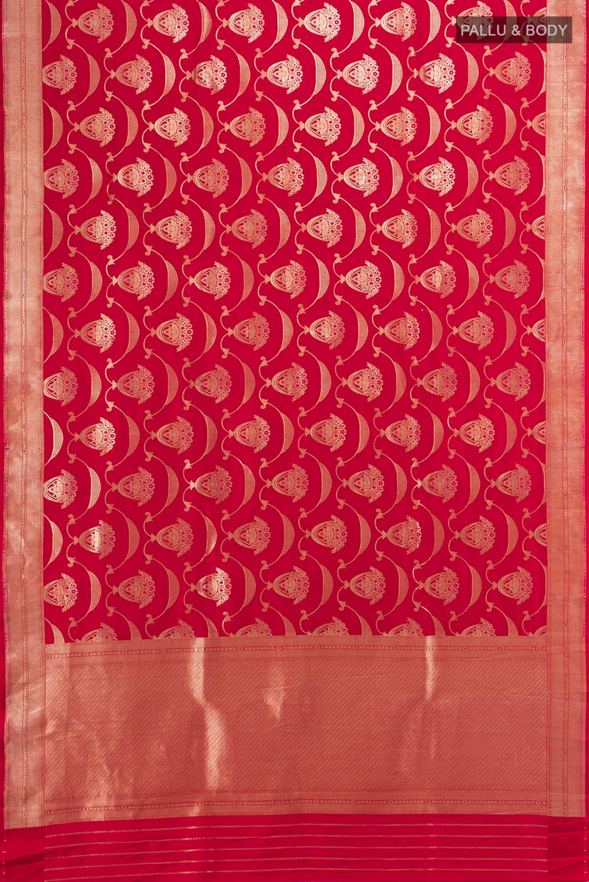 Flat view of Red Banarasi Silk Saree with Zari Butta on the body and Zari Border. 