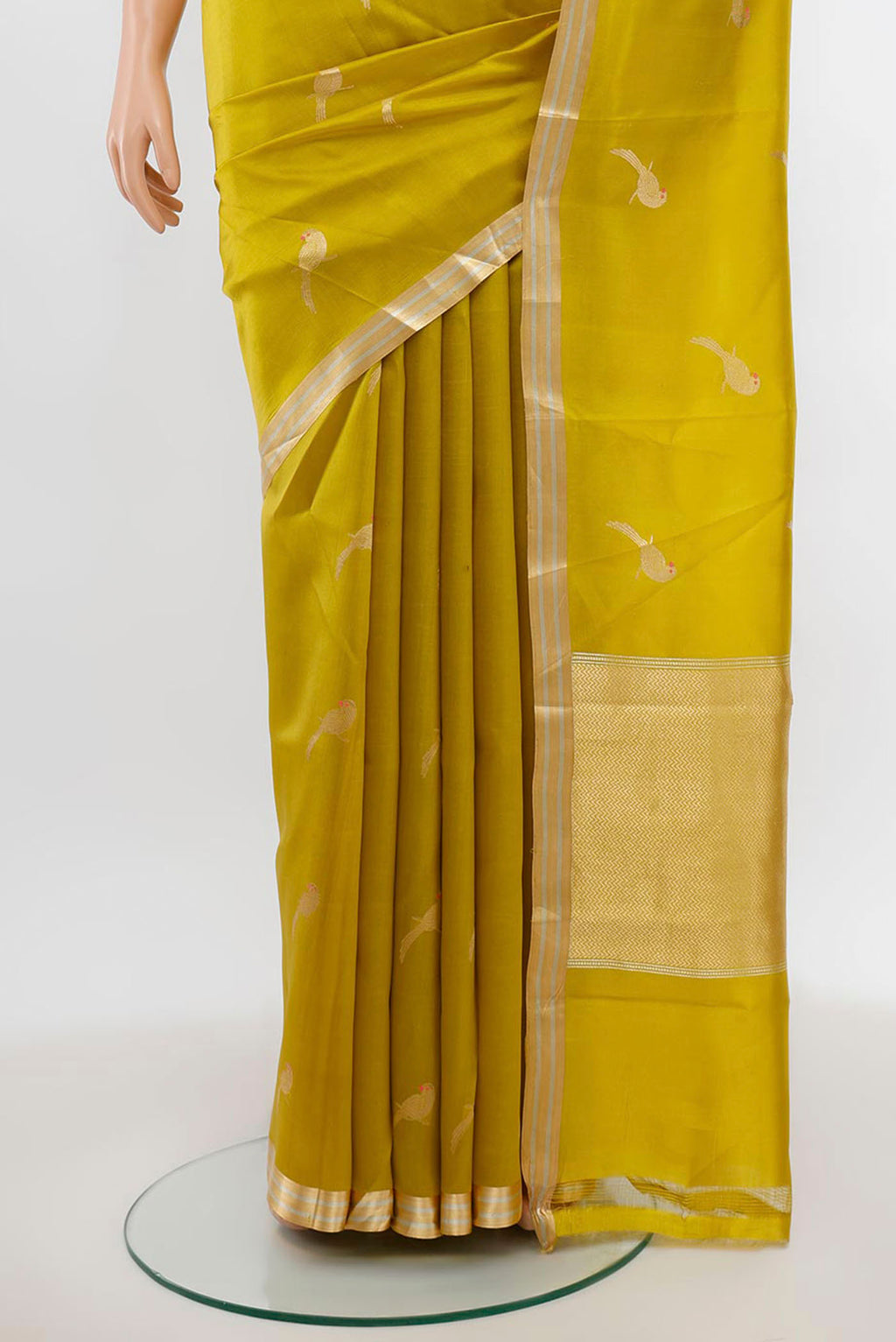 Pleats and pallu of Pista Green Banarasi Katan Silk Saree with Zari Butta on the body and Silk Border. 