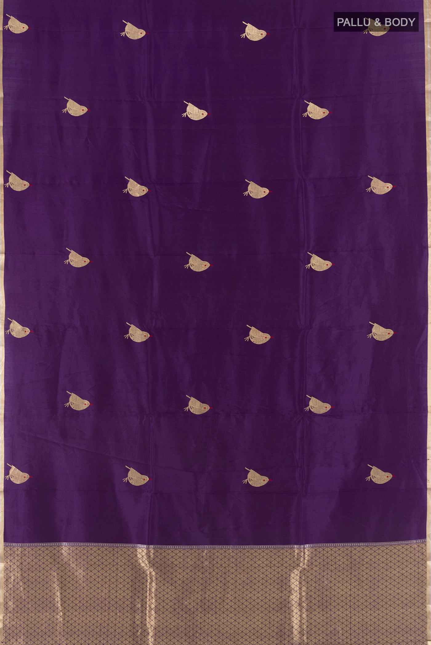 Flat view of Violet Banarasi Katan Silk Saree with Zari Butta on the body and Zari Border. 