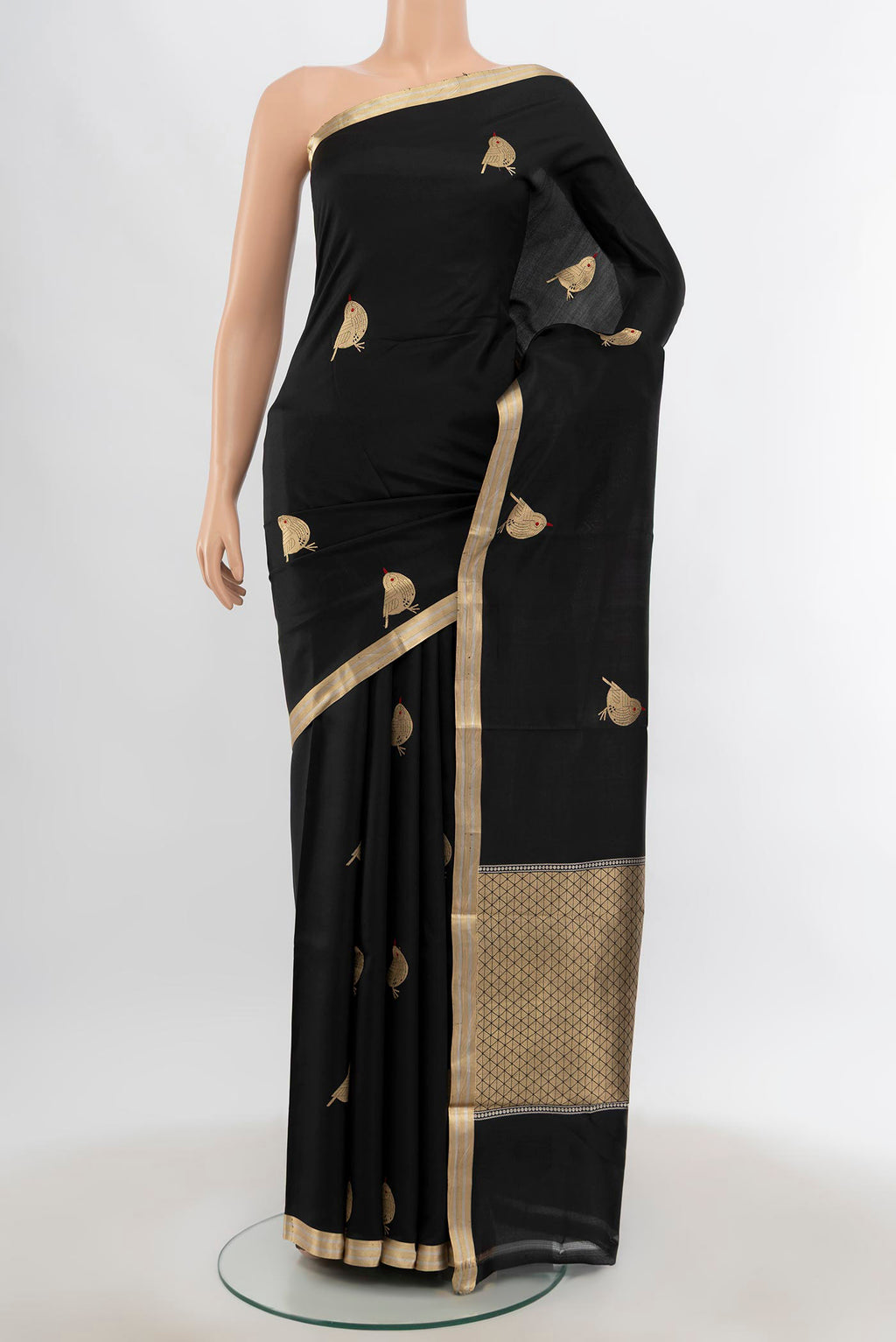 Black Banarasi Katan Silk Saree with Zari Butta on the body and Silk Border.  displayed on a mannequin